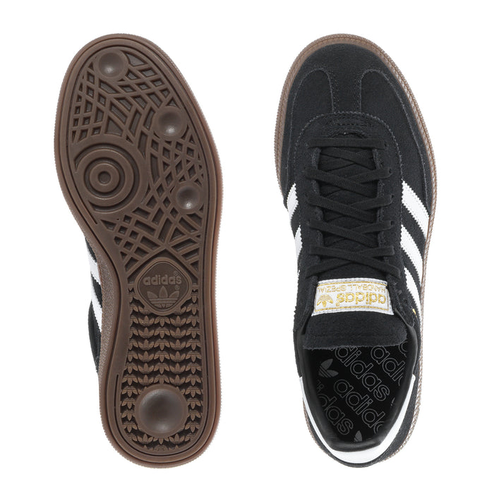 Youth black adidas sneakers: treaded outsole and lace-up top view