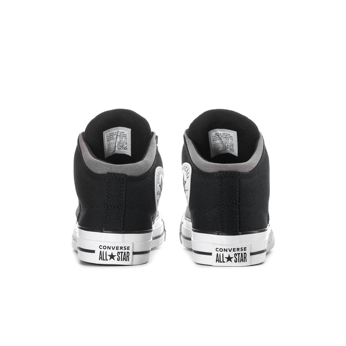 Men's Converse mid-top sneakers, black heel panels with white All Star logo text