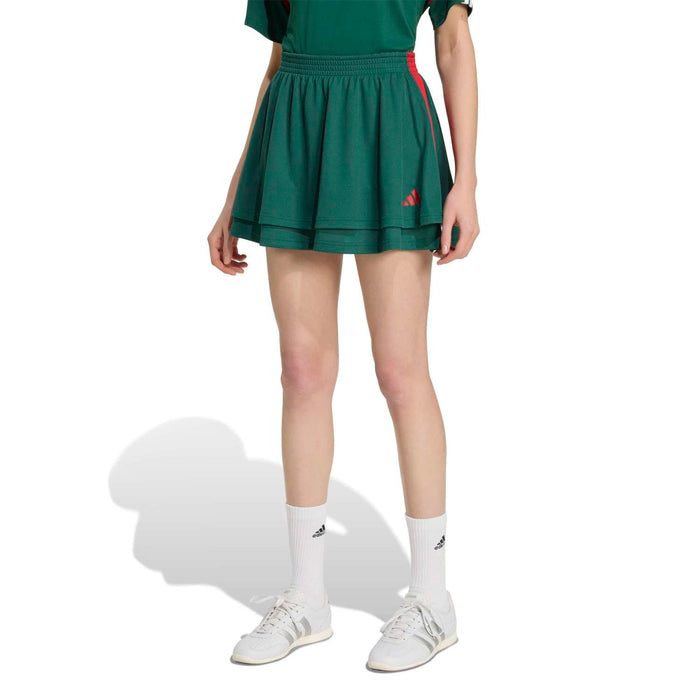 Women's dark green athletic mini skirt with elastic waistband and red side band