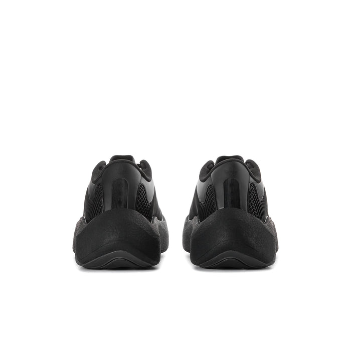 Pair of men's black sneakers with cushioned heel and lace-up closure