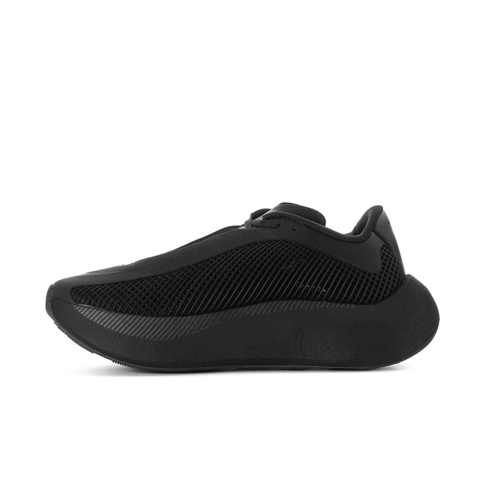 Men's black mesh sneakers with low-profile sole and curved side panel