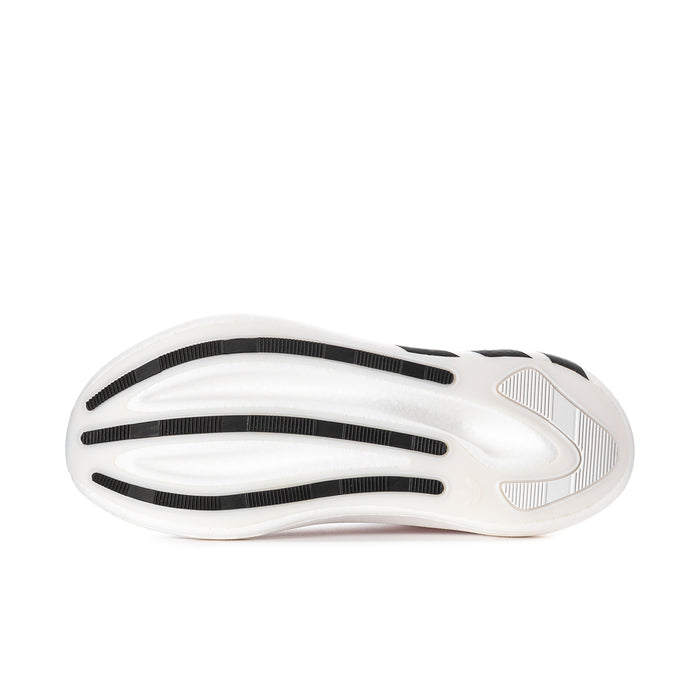 Men's sneaker outsole view with white foam base and black tread lines