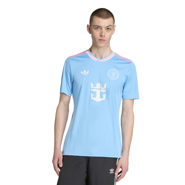 Men's light blue soccer jersey with V-neck, striped collar, and front team badge