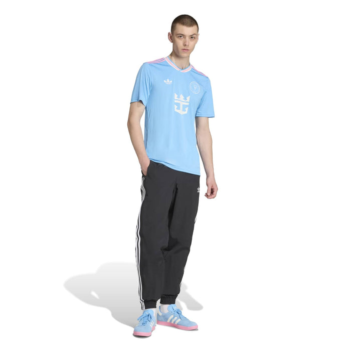 Men's light blue soccer jersey, front graphic and V-neck with pink/white striped collar