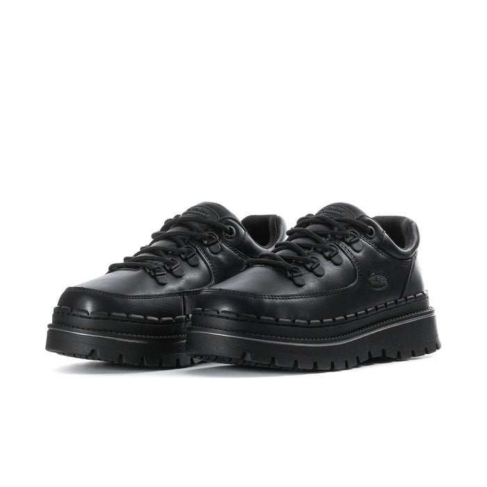 Women's black slip-resistant lace-up sneaker, toe-on view with thick tread