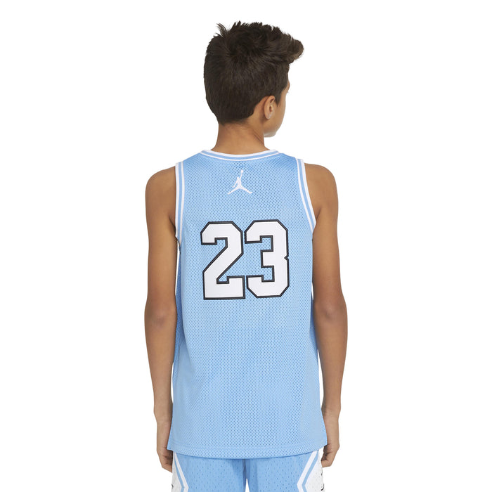 Youth light blue basketball jersey with Jordan 23 on the back and small neck logo