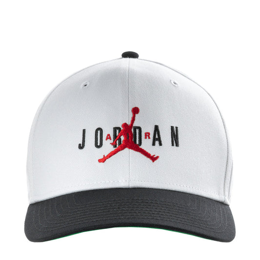 White structured snapback cap with Jordan wordmark and red Jumpman logo