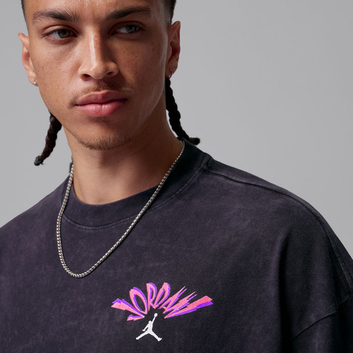 Washed black crewneck T-shirt with pink Jordan logo graphic on chest