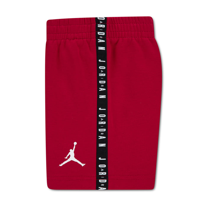 Gym Red toddler shorts with black side tape reading JORDAN and white Jumpman logo