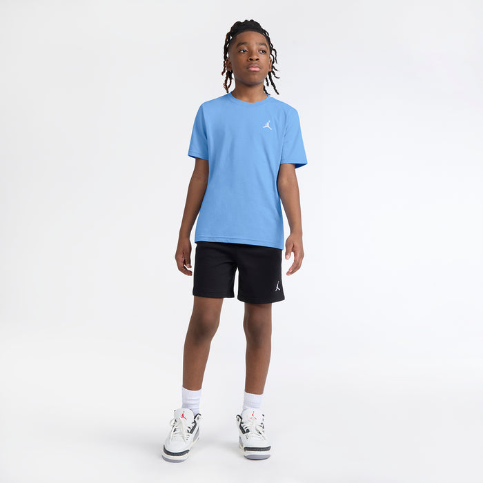 Youth crewneck T-shirt in University Blue with small white Jumpman logo