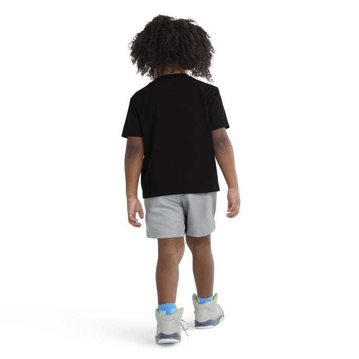 Toddler two-piece set from behind: black T-shirt and light gray pull-on shorts