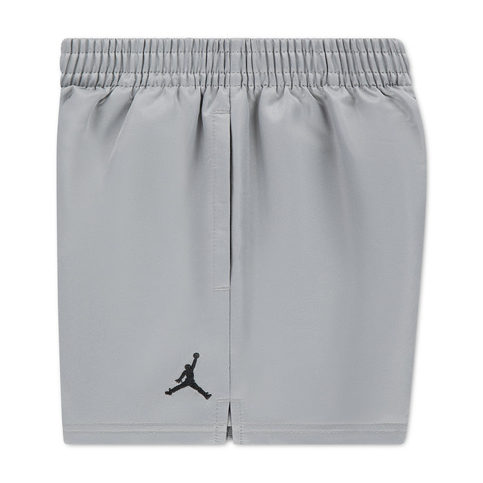 Light gray toddler pull-on shorts with black Jumpman logo on left hem