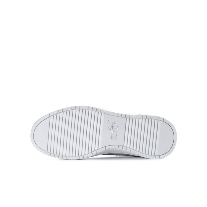 White youth sneaker outsole with textured tread and striped grip pattern