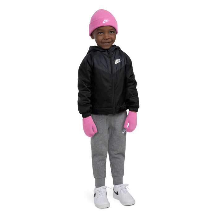 Kids pink knit beanie with Nike logo and matching pink gloves on model