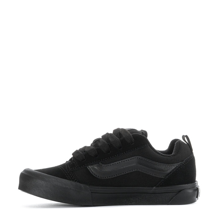 Kids triple-black lace-up sneakers, side angle with textured midsole