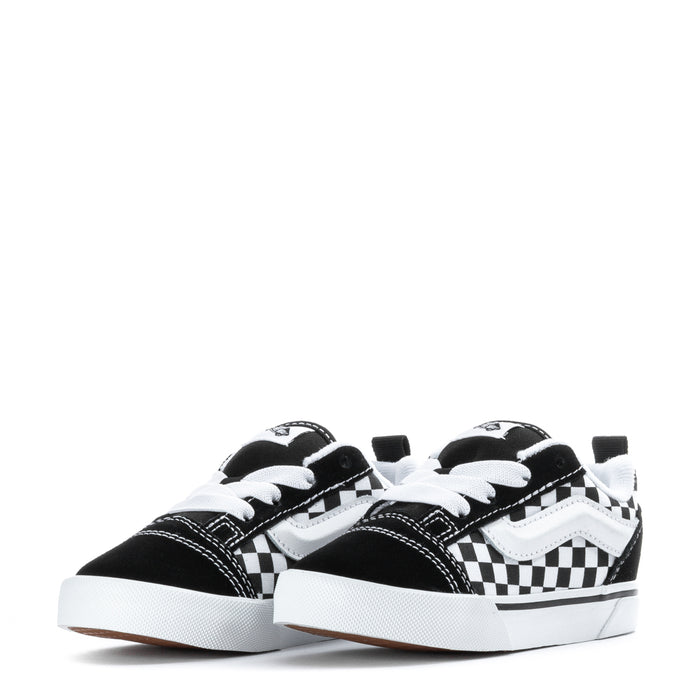 Toddler black and white checkerboard low-top sneakers, shown side-by-side.