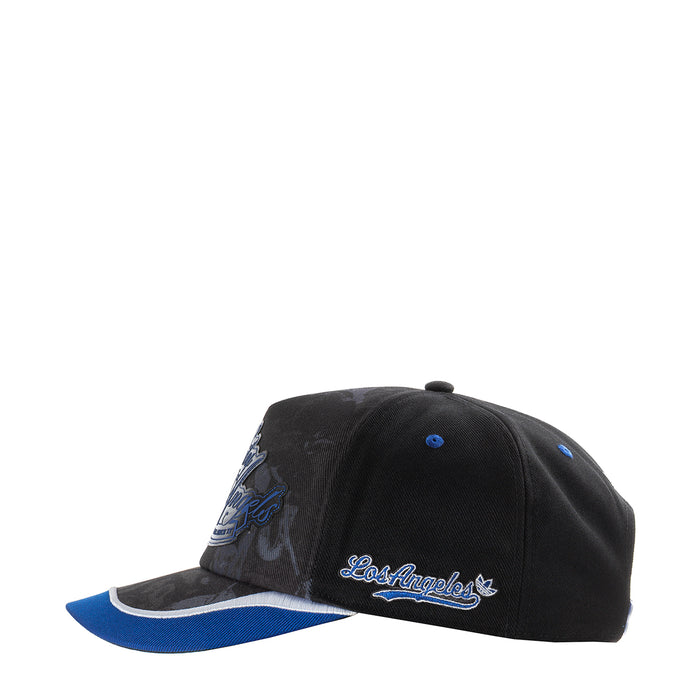 Black trucker cap with blue-and-white brim and front Los Angeles script logo