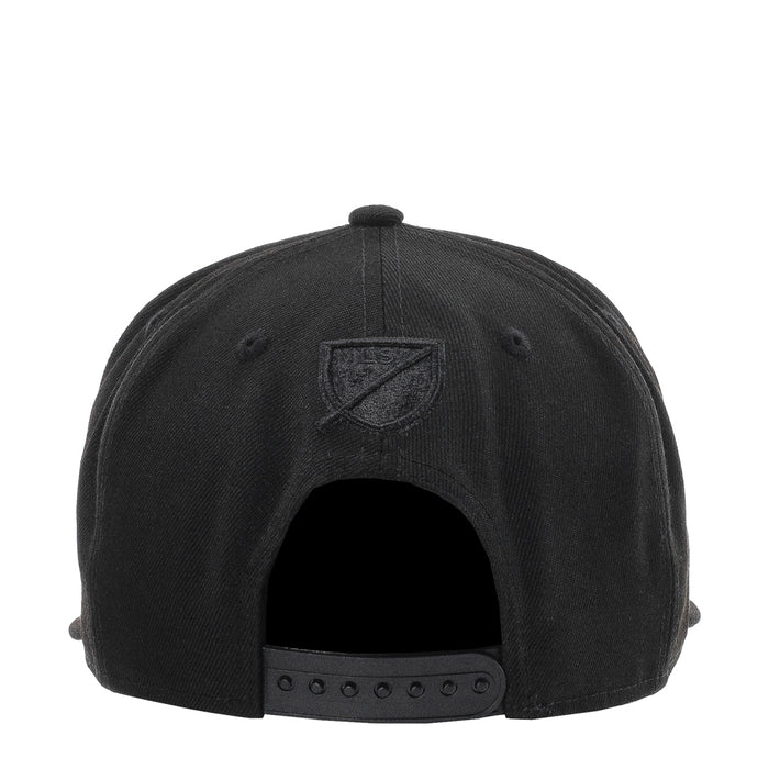 Black baseball cap with embroidered shield logo on the back