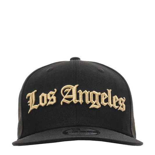 Black baseball cap with gold Los Angeles script front logo