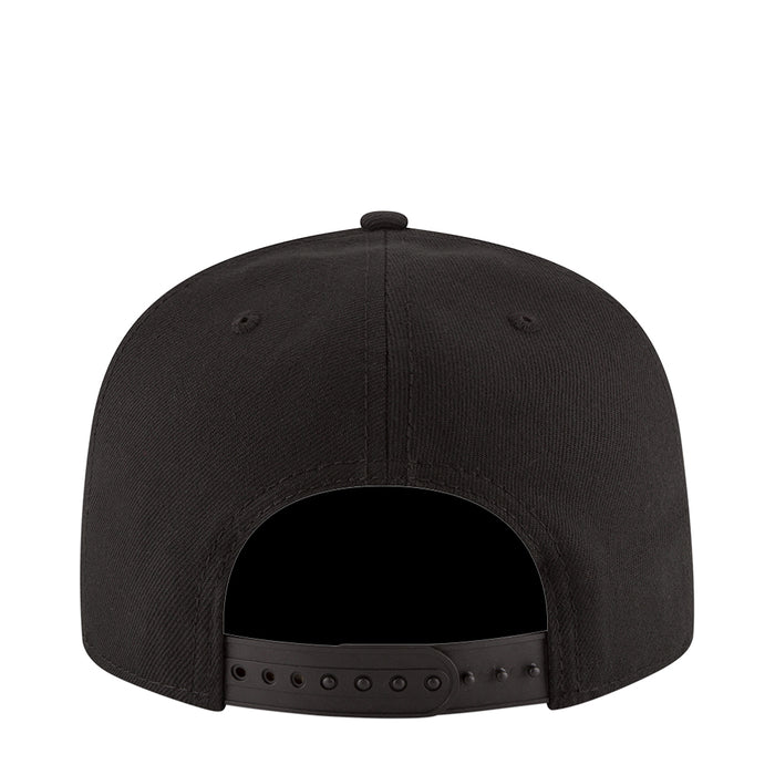 Black snapback cap with adjustable back strap and open rear view