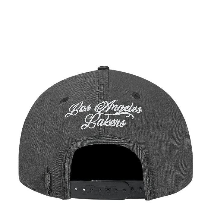 Washed black snapback cap with “Los Angeles Lakers” script logo on back