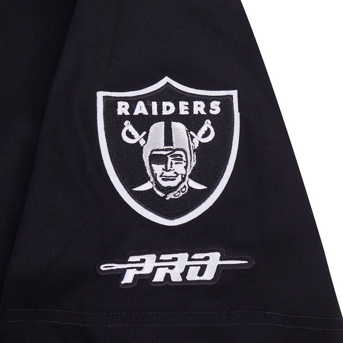 Close-up of Raiders shield logo and short 'PROD' text on black T-shirt sleeve