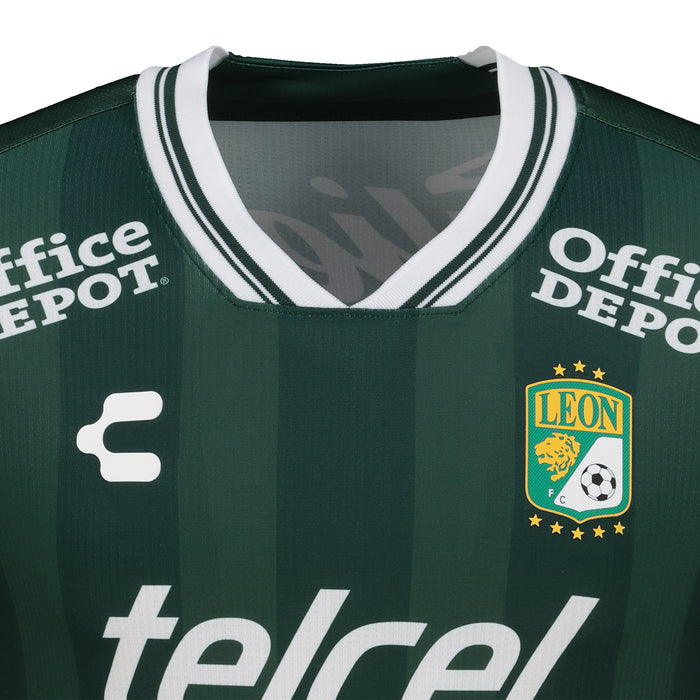 Dark green men’s soccer jersey close-up with Office Depot sleeves, telcel print, and crest