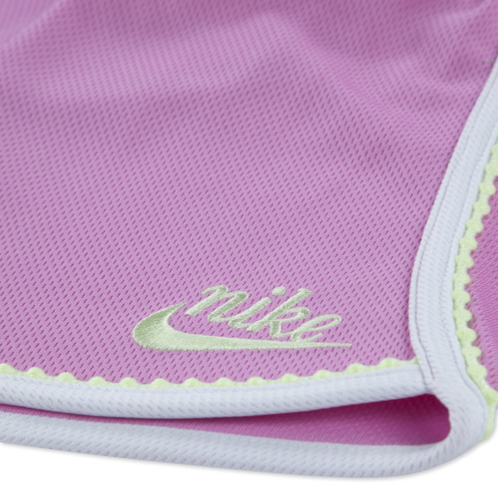 Light magenta shorts hem with Nike logo embroidery and contrast piping