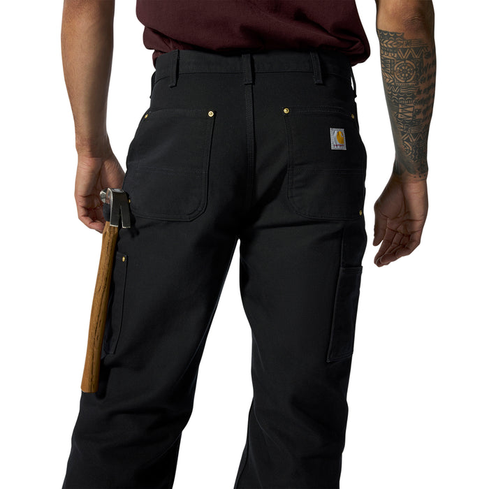 Black work dungaree pants back view with cargo pockets, belt loops, and side tool loop