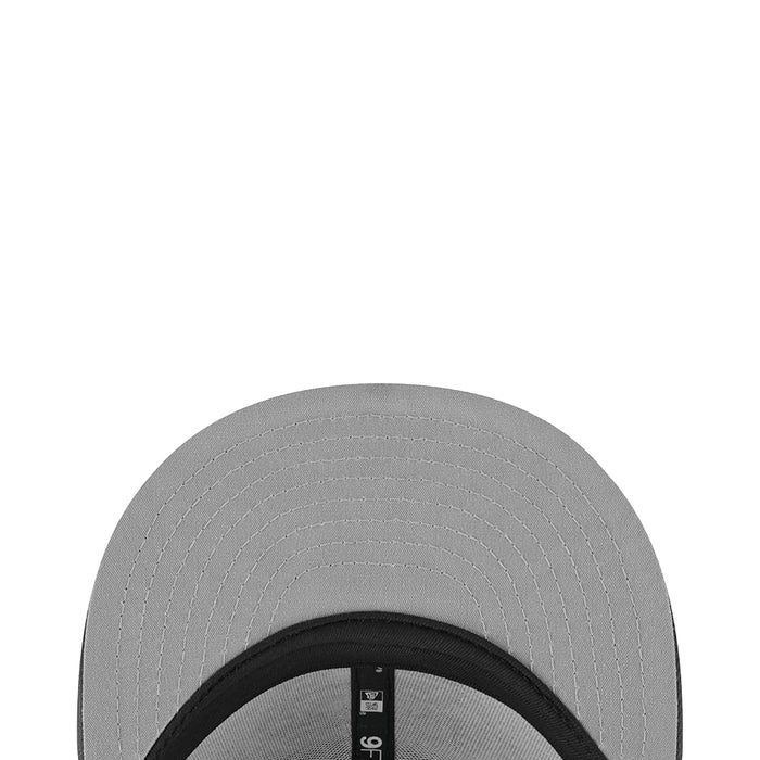 Light gray baseball cap top view with stitched panels and dark inner brim