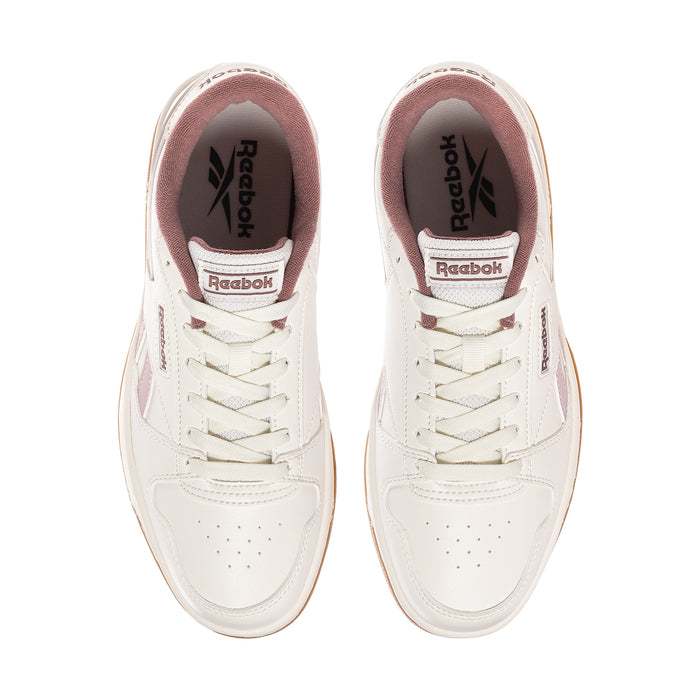 Women’s Reebok Match Prime V2 sneakers, white with mauve lining and Reebok logo on tongue.
