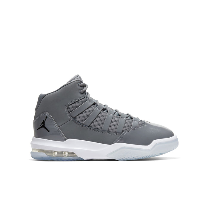 Youth basketball shoes in cool grey with strap, laced ankle, and white sole