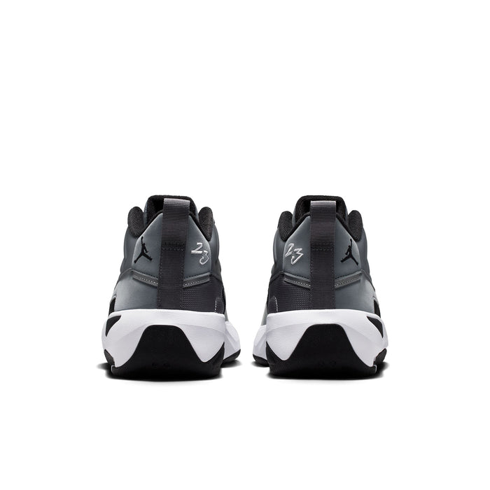 Men's high-top sneakers from heel view with black tabs and white wedge midsole