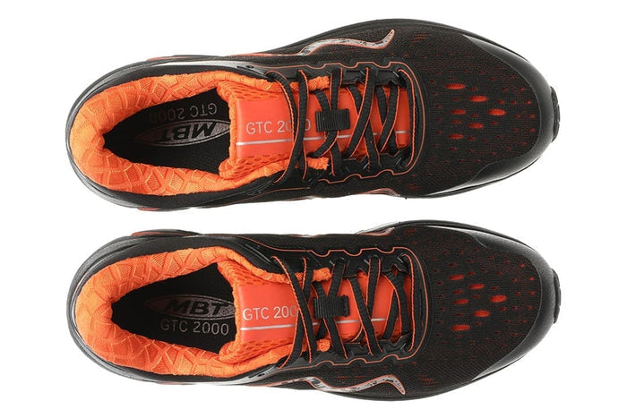 Svart MBT 2000 Black Mars löparsko för män sett uppifrån, med orange detaljer och rullsula.