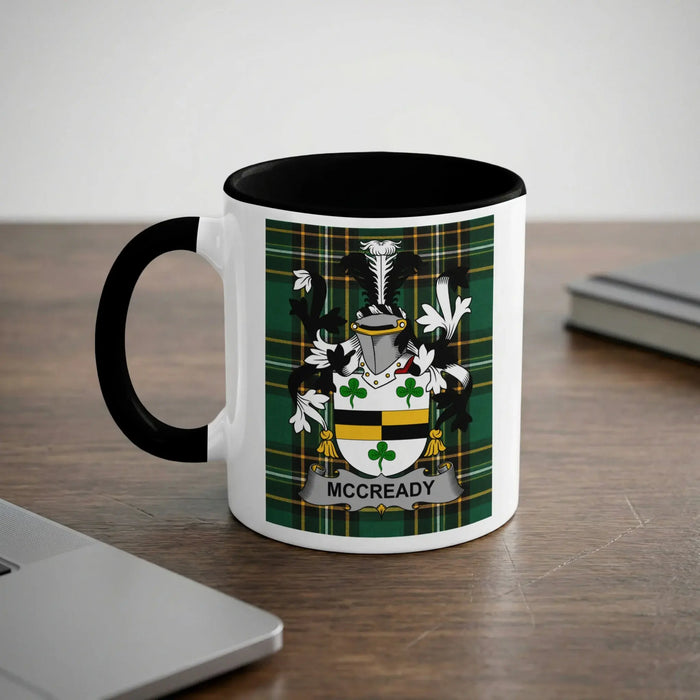 McCready Irish heritage mug with black handle and family crest