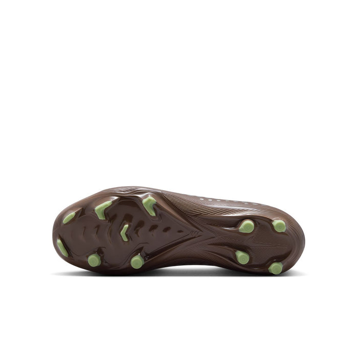 Youth plum soccer cleat outsole with green-tinted molded studs for FG/MG traction