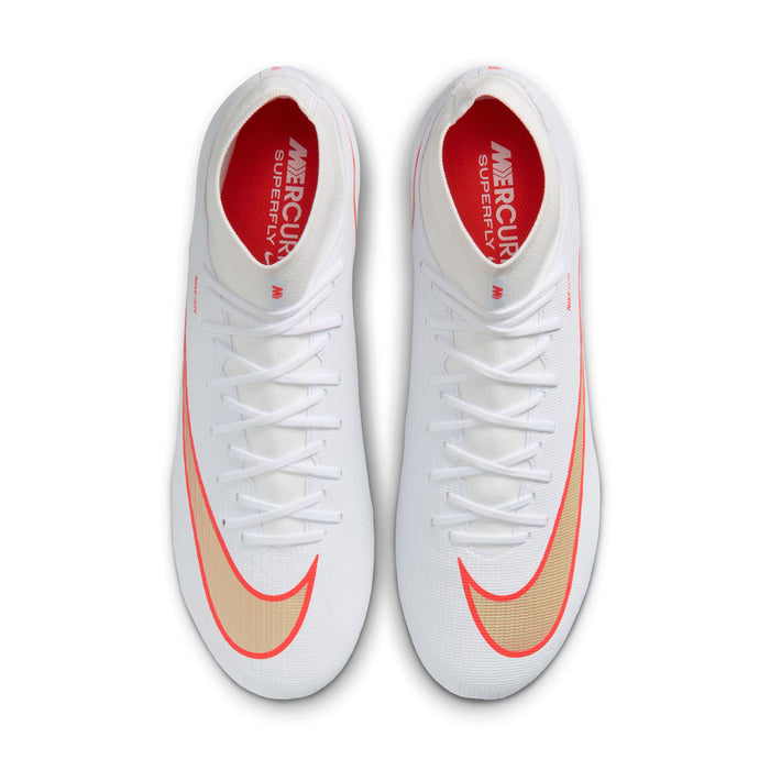 Pair of men's white soccer cleats showing red-lined laces and red Nike logo badges