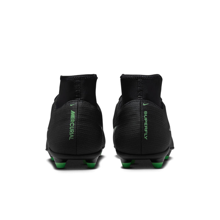 Men's black cleats with green accent heel pull and molded FG/MG studs