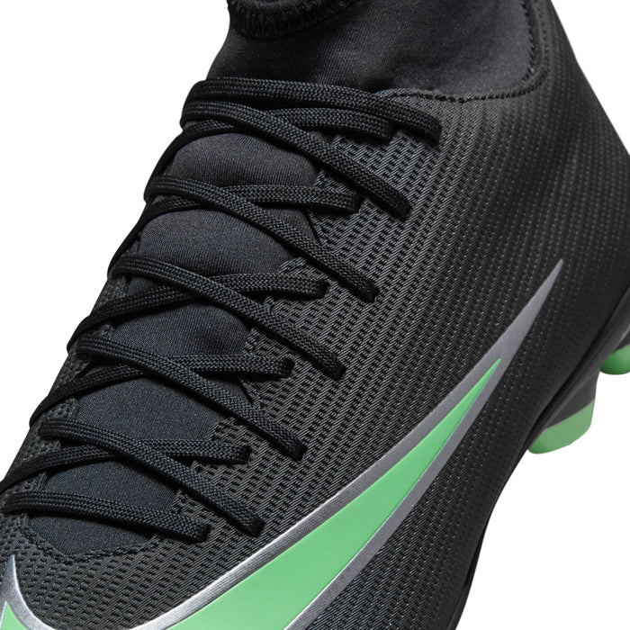 Black lace-up soccer cleat upper with textured finish and green side stripe