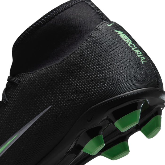 Black cleat with green outsole studs and Mercurial heel branding