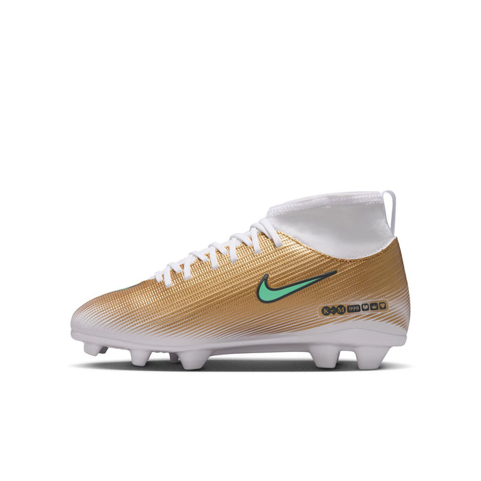 Youth soccer cleat side view: metallic gold upper, green swoosh, white laces.