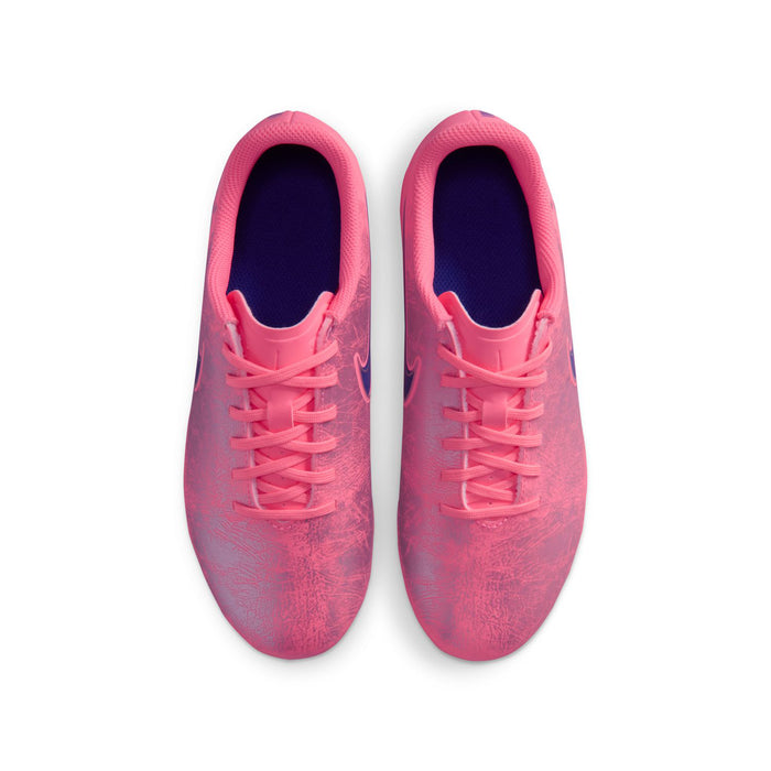 Youth pink soccer cleats with navy-lined collar and lace-up closure