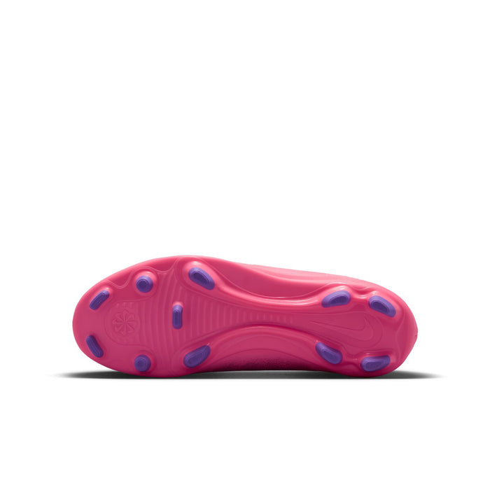 Youth pink soccer cleat outsole with molded studs and circular traction holes