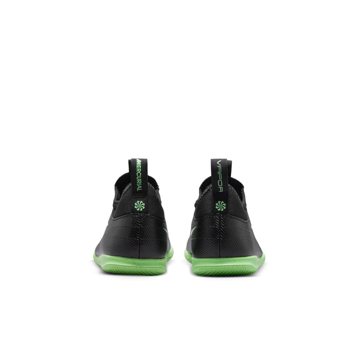 Kids black Mercurial Vapor club cleat, heel view with neon green outsole