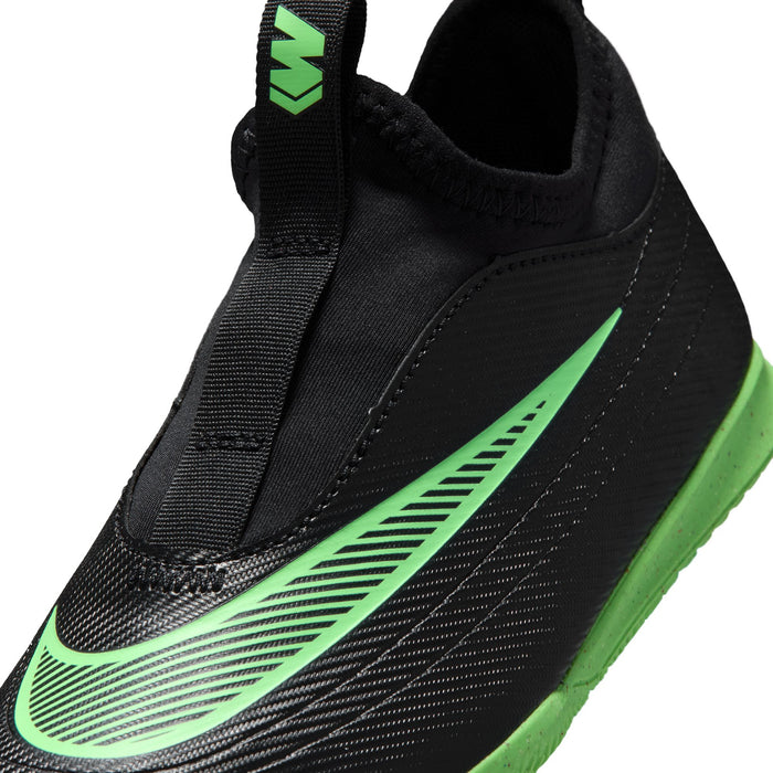 Kids Mercurial Vapor club cleat upper close-up, black knit with neon green swoosh