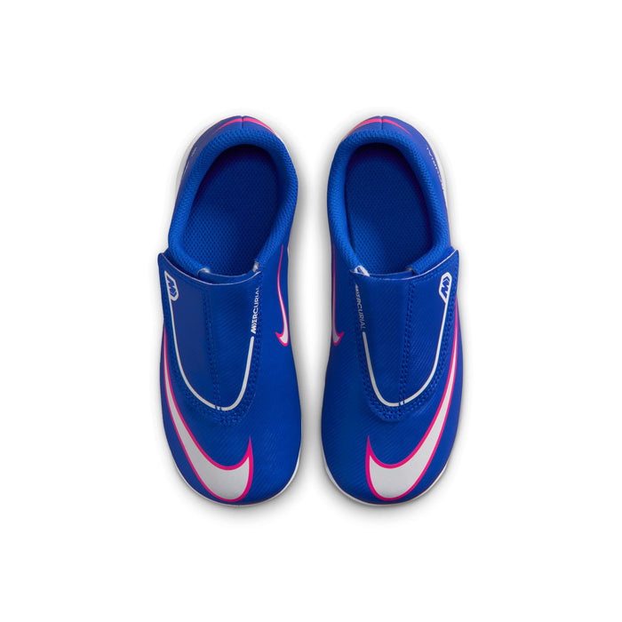 Pair of kids blue soccer cleats with pink swoosh logos and white midsoles