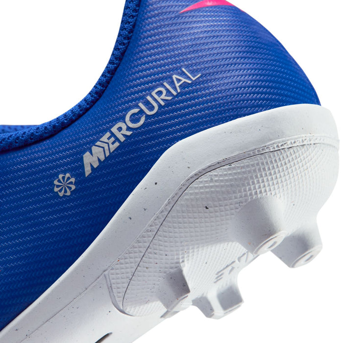 Kids blue soccer cleat quarter panel with Mercurial logo and white textured sole