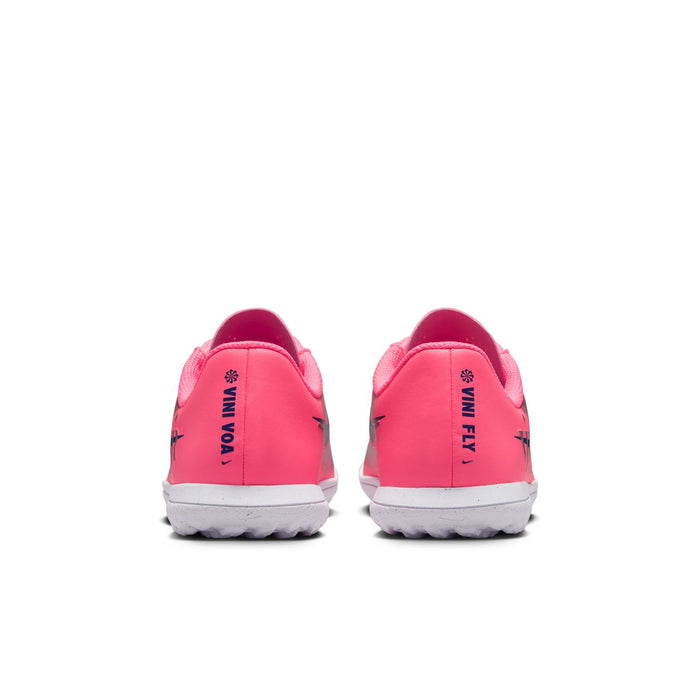 Youth pink soccer shoes with 'VIN VO A' branding at heel and white outsole tread