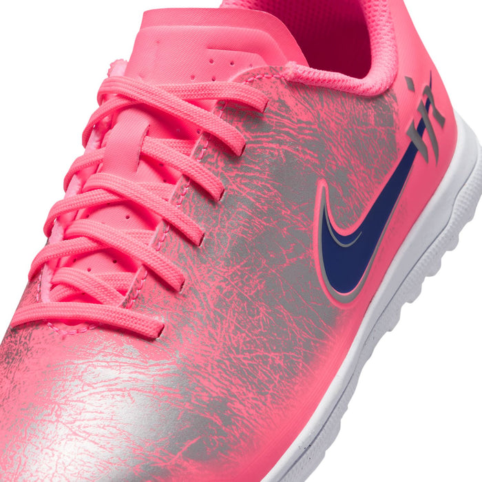 Youth pink textured upper with lace rows and blue Nike swoosh