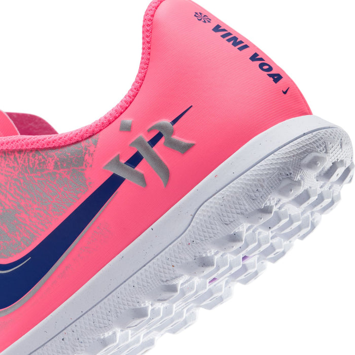 Youth pink heel with 'VIN VO A' text, blue trim, and grippy white turf studs